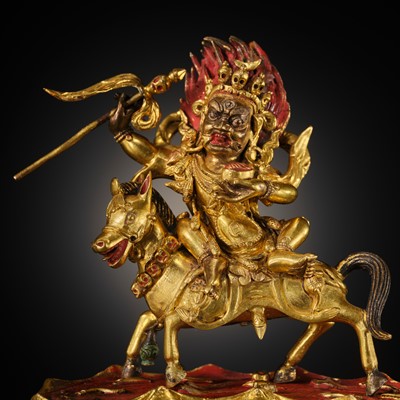 Lot 21 - A FINE AND RARE GILT-BRONZE FIGURE OF PALDEN LHAMO, 18TH-19TH CENTURY