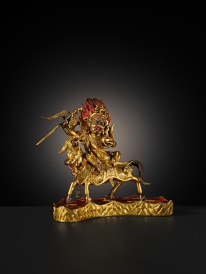 Lot 21 - A FINE AND RARE GILT-BRONZE FIGURE OF PALDEN LHAMO, 18TH-19TH CENTURY