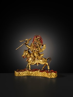 Lot 21 - A FINE AND RARE GILT-BRONZE FIGURE OF PALDEN LHAMO, 18TH-19TH CENTURY