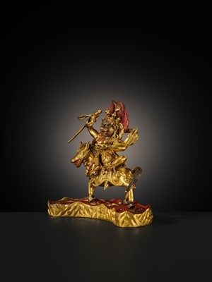 Lot 21 - A FINE AND RARE GILT-BRONZE FIGURE OF PALDEN LHAMO, 18TH-19TH CENTURY