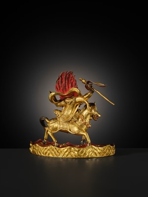Lot 21 - A FINE AND RARE GILT-BRONZE FIGURE OF PALDEN LHAMO, 18TH-19TH CENTURY