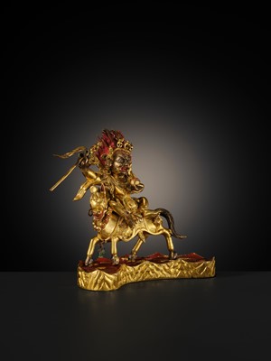 Lot 21 - A FINE AND RARE GILT-BRONZE FIGURE OF PALDEN LHAMO, 18TH-19TH CENTURY