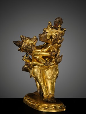 A SMALL AND RARE GILT-BRONZE FIGURE OF VAJRAVARAHI AND VARAHA, 18TH-19TH CENTURY