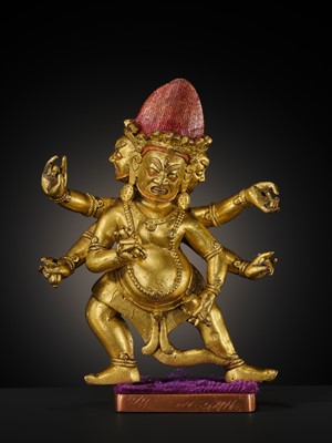 Lot 22 - A GILT-BRONZE FIGURE OF SHADBHUJA MAHAKALA, 18TH-19TH CENTURY