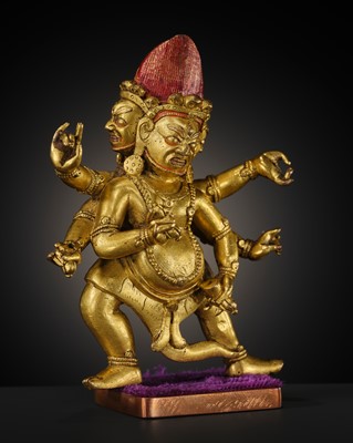 Lot 22 - A GILT-BRONZE FIGURE OF SHADBHUJA MAHAKALA, 18TH-19TH CENTURY