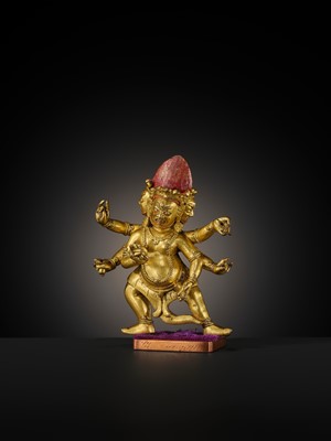 Lot 22 - A GILT-BRONZE FIGURE OF SHADBHUJA MAHAKALA, 18TH-19TH CENTURY