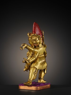 Lot 22 - A GILT-BRONZE FIGURE OF SHADBHUJA MAHAKALA, 18TH-19TH CENTURY