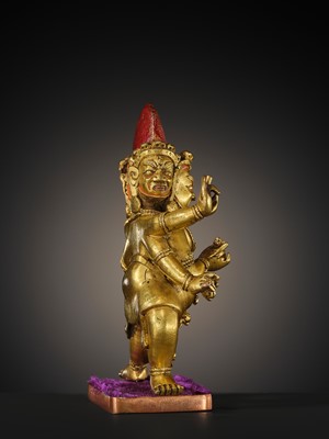 Lot 22 - A GILT-BRONZE FIGURE OF SHADBHUJA MAHAKALA, 18TH-19TH CENTURY