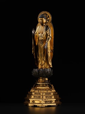 A GILT-LACQUERED WOOD FIGURE OF AMIDA NYORAI, KAMAKURA PERIOD, WITH C14 TEST CONFIRMING THE DATING
