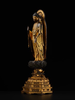 A GILT-LACQUERED WOOD FIGURE OF AMIDA NYORAI, KAMAKURA PERIOD, WITH C14 TEST CONFIRMING THE DATING