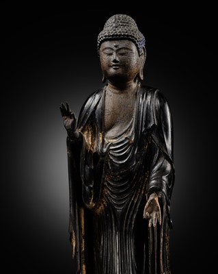 A GILT-LACQUERED WOOD FIGURE OF AMIDA NYORAI, LATE KAMAKURA PERIOD, WITH C14 TEST CONFIRMING THE DATING