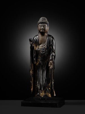 A GILT-LACQUERED WOOD FIGURE OF AMIDA NYORAI, LATE KAMAKURA PERIOD, WITH C14 TEST CONFIRMING THE DATING