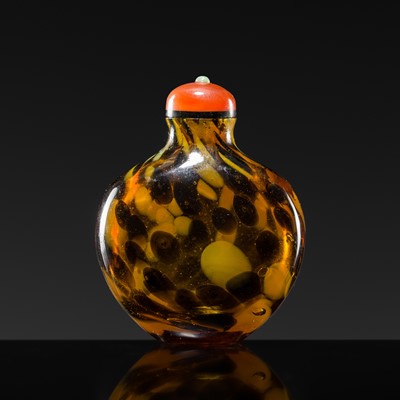 Lot 472 - AN IMPERIAL REALGAR-SPLASHED AMBER GLASS SNUFF BOTTLE, 18TH CENTURY