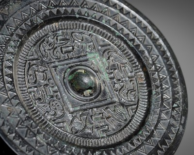 Lot 375 - A ‘TLV’ BRONZE MIRROR, HAN DYNASTY