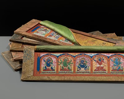 Lot 50 - A SET OF SIX FINELY PAINTED INNER COVER PANELS FROM THE 1794 QIANLONG KANGYUR IN MANCHU SCRIPT