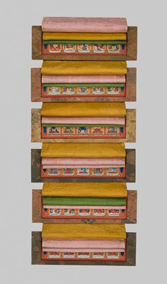 Lot 50 - A SET OF SIX FINELY PAINTED INNER COVER PANELS FROM THE 1794 QIANLONG KANGYUR IN MANCHU SCRIPT