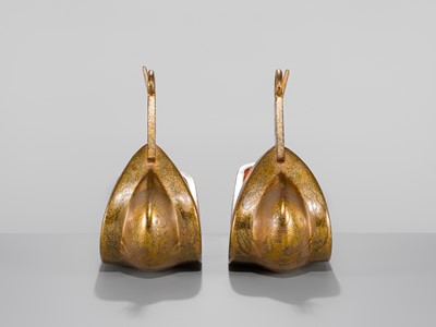 Lot 132 - A PAIR OF GOLD-LACQUERED STIRRUPS (ABUMI) WITH SHIMAZU CLAN MON