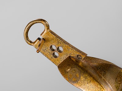 Lot 132 - A PAIR OF GOLD-LACQUERED STIRRUPS (ABUMI) WITH SHIMAZU CLAN MON