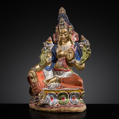 Lot 24 - A GILT AND POLYCHROME DRY LACQUER FIGURE OF TARA, 18TH-19TH CENTURY