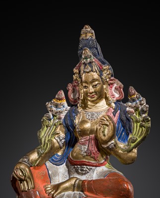 Lot 24 - A GILT AND POLYCHROME DRY LACQUER FIGURE OF TARA, 18TH-19TH CENTURY