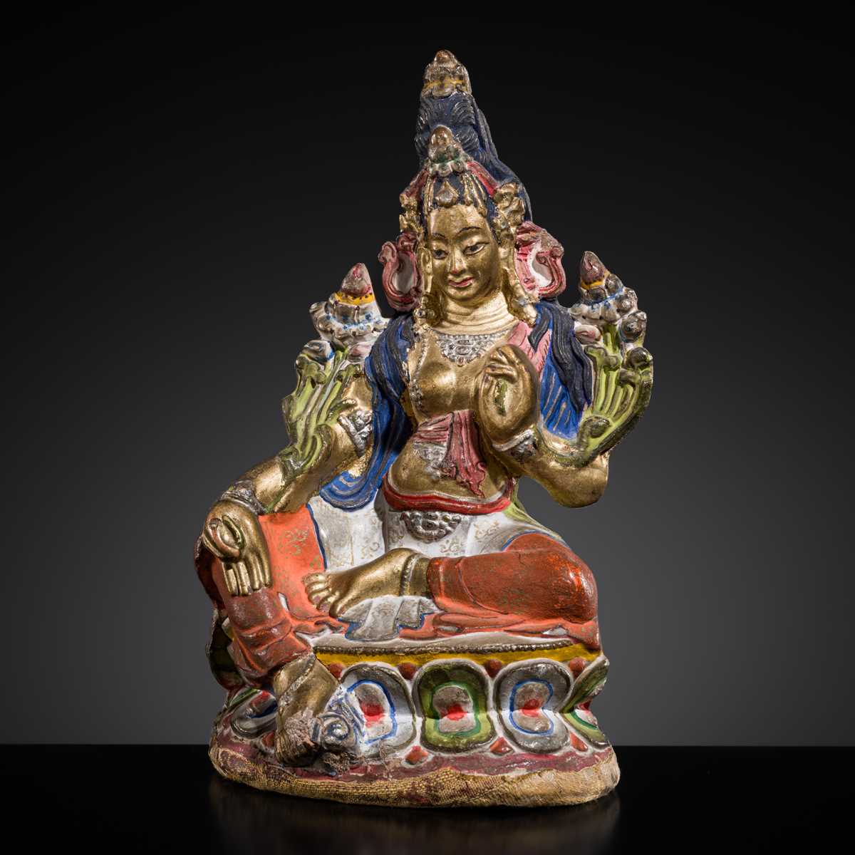 Lot 24 - A GILT AND POLYCHROME DRY LACQUER FIGURE OF TARA, 18TH-19TH CENTURY