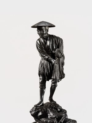 Lot 34 - YOSHITANI: A LARGE TOKYO SCHOOL BRONZE OKIMONO OF A FISHERMAN