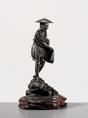 Lot 34 - YOSHITANI: A LARGE TOKYO SCHOOL BRONZE OKIMONO OF A FISHERMAN