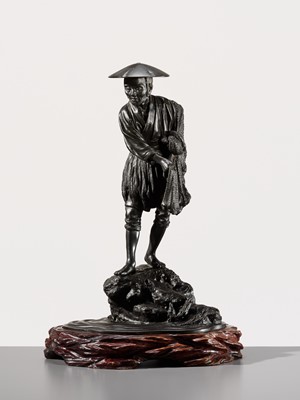 Lot 34 - YOSHITANI: A LARGE TOKYO SCHOOL BRONZE OKIMONO OF A FISHERMAN