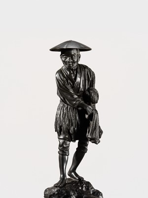 Lot 34 - YOSHITANI: A LARGE TOKYO SCHOOL BRONZE OKIMONO OF A FISHERMAN