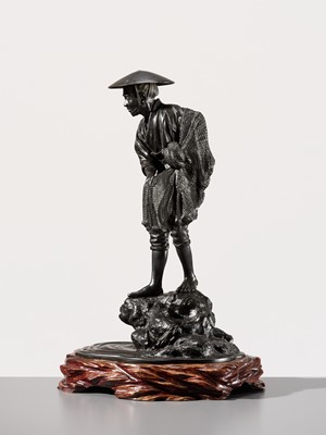 Lot 34 - YOSHITANI: A LARGE TOKYO SCHOOL BRONZE OKIMONO OF A FISHERMAN