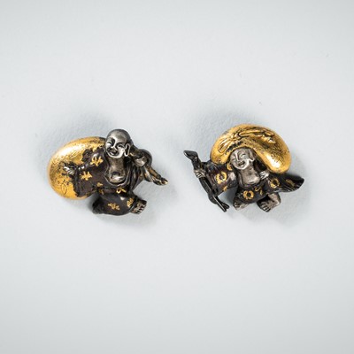 Lot 1963 - A PAIR OF SHIBUICHI MENUKI DEPICTING HOTEI WITH HIS TREASURE BAG