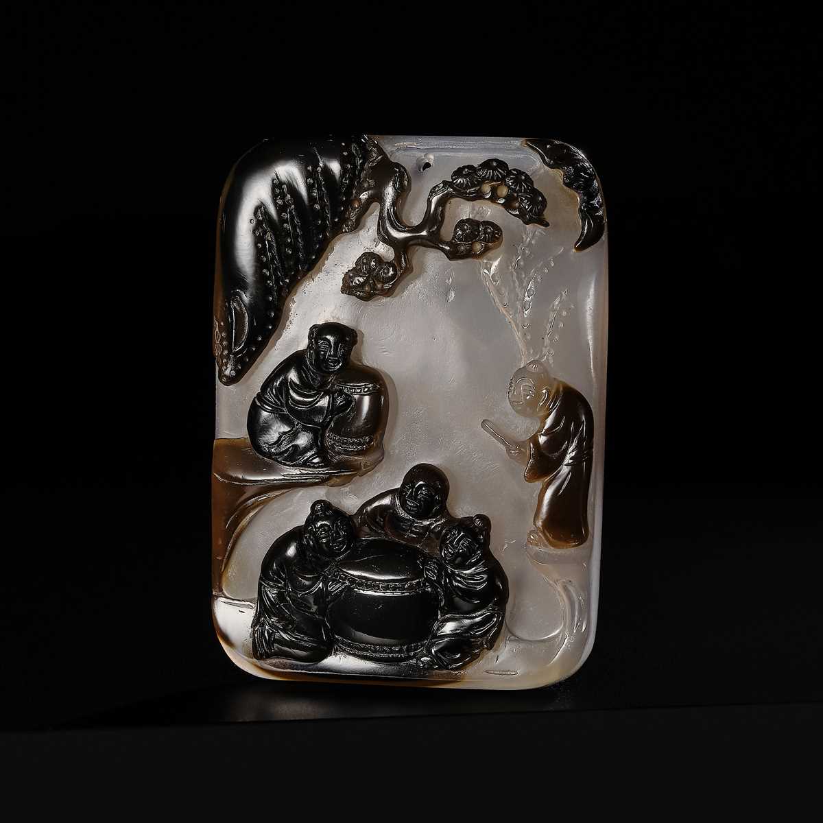 A GILT-INSCRIBED SUZHOU AGATE PENDANT, DATED 1804