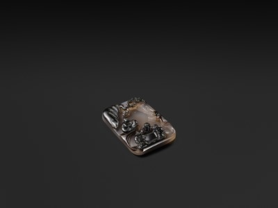 A GILT-INSCRIBED SUZHOU AGATE PENDANT, DATED 1804