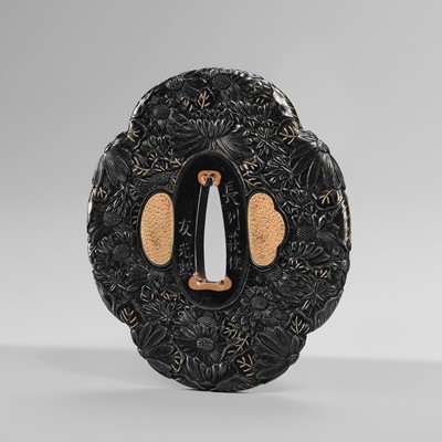 Lot 66 - TOMOMITSU: A FINE SHAKUDO TSUBA WITH KIKU (CHRYSANTHEMUMS)