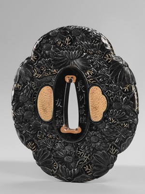 Lot 66 - TOMOMITSU: A FINE SHAKUDO TSUBA WITH KIKU (CHRYSANTHEMUMS)
