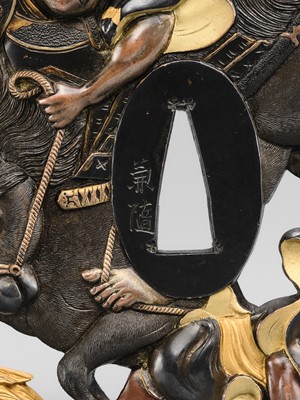 Lot 79 - KANEYUKI: A SUPERB AND LARGE SUKASHI KINKO TSUBA WITH A SAMURAI ON HORSEBACK