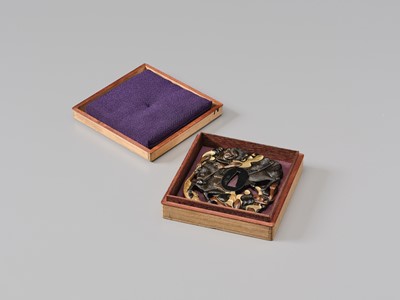 Lot 79 - KANEYUKI: A SUPERB AND LARGE SUKASHI KINKO TSUBA WITH A SAMURAI ON HORSEBACK