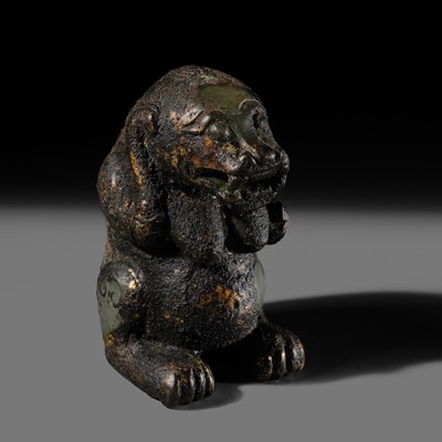 Lot 122 - A RARE GILT-JADE FIGURE OF A BEAR, HAN DYNASTY