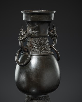Lot 379 - A DRAGON-HANDLED ‘TAOTIE’ BRONZE VASE, HU, YUAN - EARLY MING DYNASTY