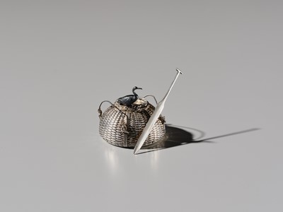 Lot 19 - HATTORI: A FINE SILVER AND SHAKUDO ‘CORMORANT FISHING’ YOJITATE (TOOTHPICK HOLDER)