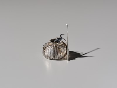 Lot 19 - HATTORI: A FINE SILVER AND SHAKUDO ‘CORMORANT FISHING’ YOJITATE (TOOTHPICK HOLDER)