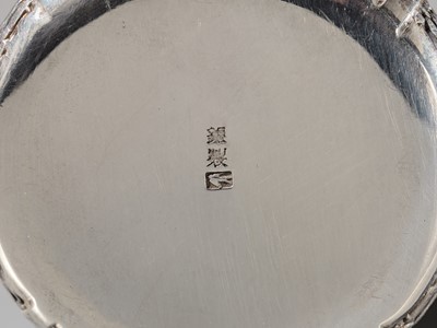 Lot 19 - HATTORI: A FINE SILVER AND SHAKUDO ‘CORMORANT FISHING’ YOJITATE (TOOTHPICK HOLDER)