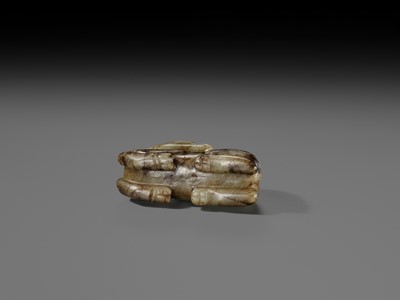 A CELADON AND BROWN JADE FIGURE OF A HORSE, MING DYNASTY