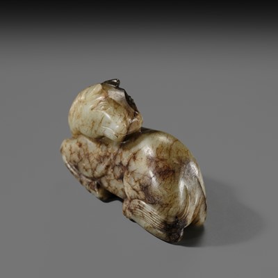 A CELADON AND BROWN JADE FIGURE OF A HORSE, MING DYNASTY