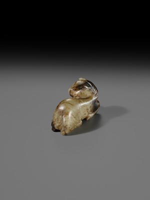 A CELADON AND BROWN JADE FIGURE OF A HORSE, MING DYNASTY