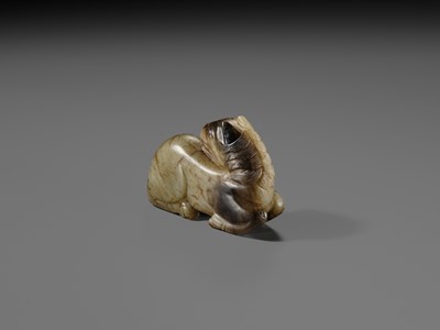 A CELADON AND BROWN JADE FIGURE OF A HORSE, MING DYNASTY