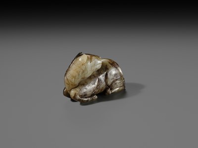 A CELADON AND BROWN JADE FIGURE OF A HORSE, MING DYNASTY