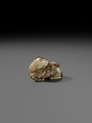 A CELADON AND BROWN JADE FIGURE OF A HORSE, MING DYNASTY