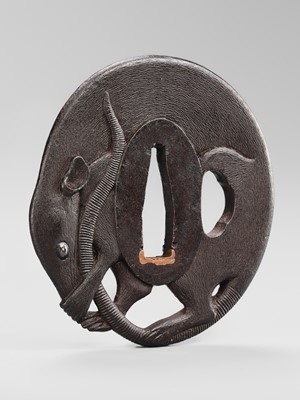A FINE AND RARE KO-KINKO IRON TSUBA OF A COILED RAT