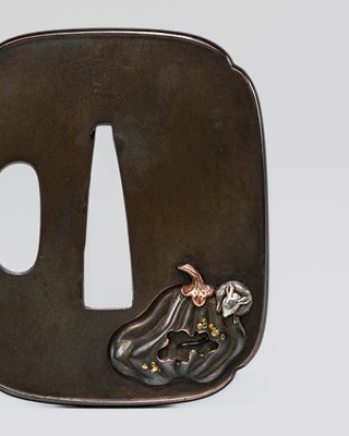 A FINE SHIBUICHI ‘RAT AND PUMPKIN’ TSUBA